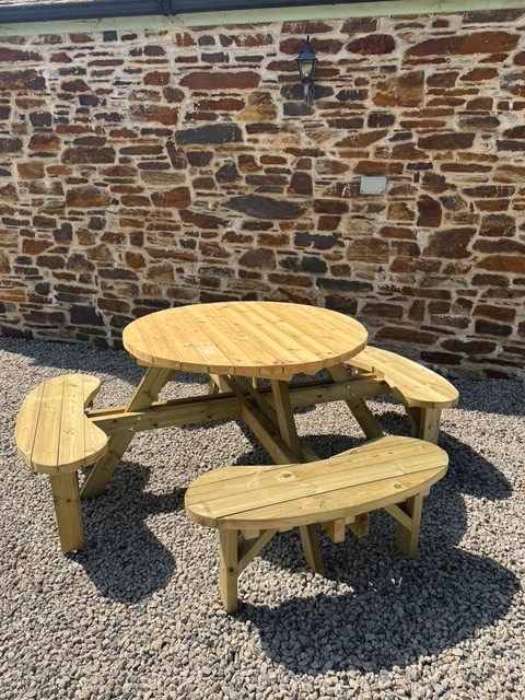The Cornish Circular Picnic Bench in heavy tanalised timber
