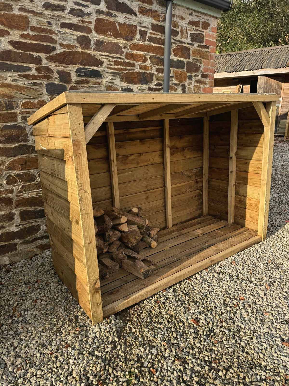 Large Featheredge Log Store in heavy tanalised timber